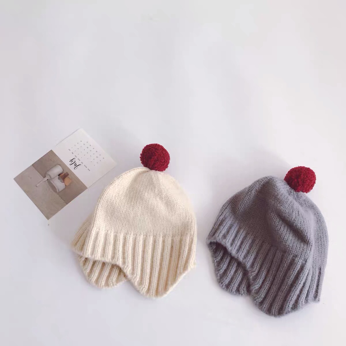 Ins wind pure color big ball children knitting ear protection hat autumn winter lovely warm baby bean hat wool hat Item Picture